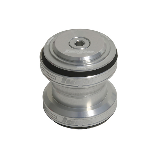 Silver metal component with black ring on a white background