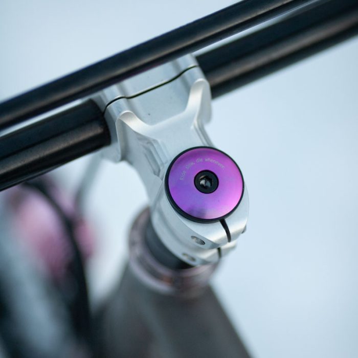 Stridsland - Titanium Top Cap - "Ride Slow, Die Whenever"