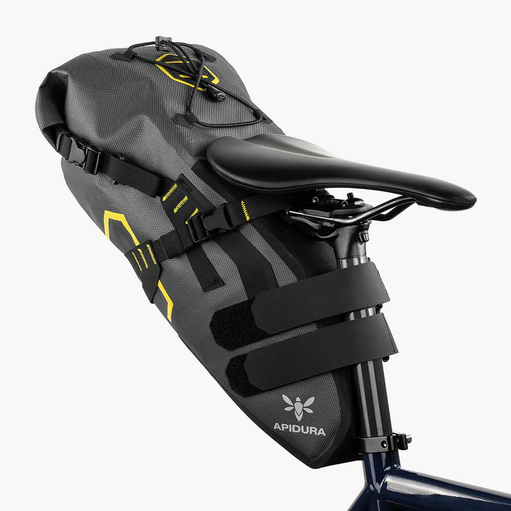 Black bike saddle bag with yellow accents on a white background