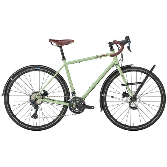 Green bicycle with brown seat and handlebars on a white background