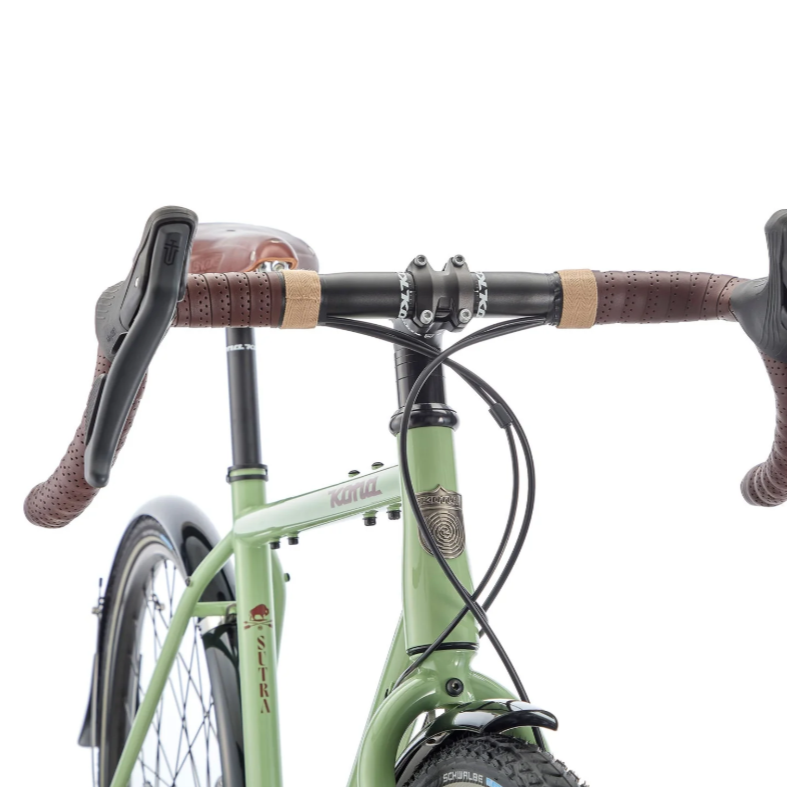 Green bicycle with brown handlebars on a white background