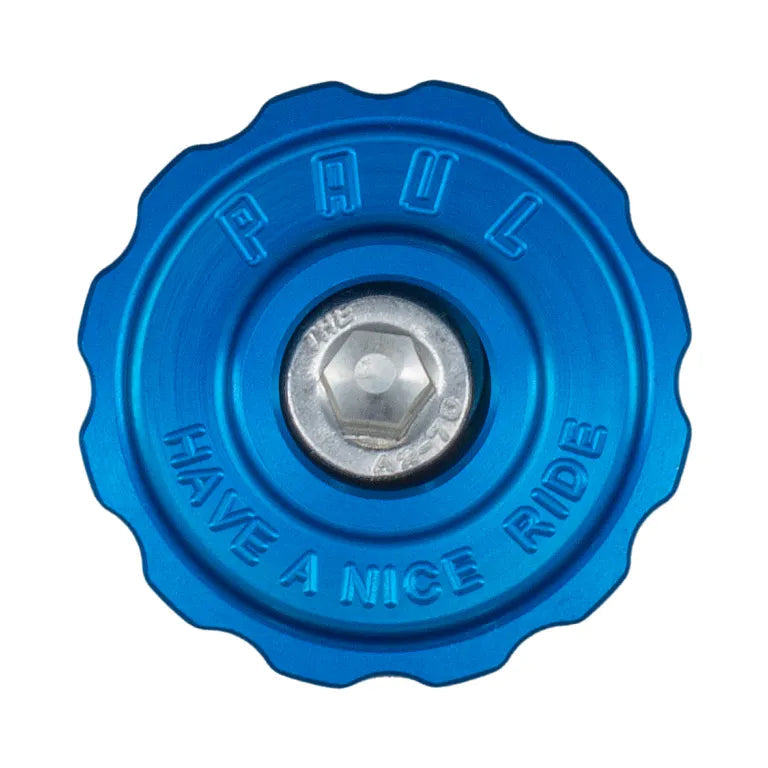 Blue valve cap with 'Paul' and 'Have a Nice Ride' text on a white background