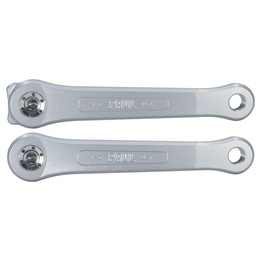 Two silver metal wrenches on a white background