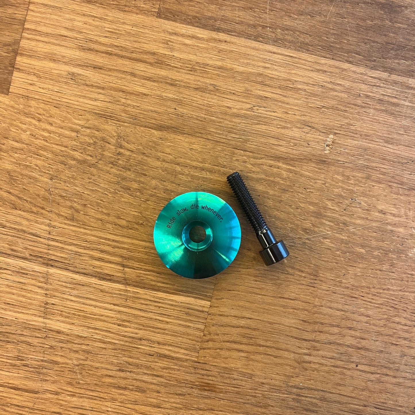 Stridsland - Titanium Top Cap - "Ride Slow, Die Whenever"