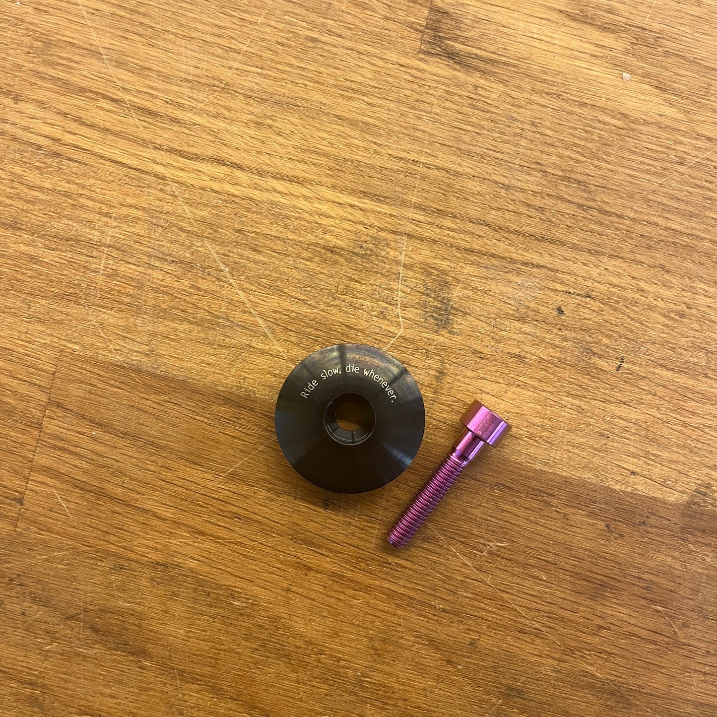 Stridsland - Titanium Top Cap - "Ride Slow, Die Whenever"