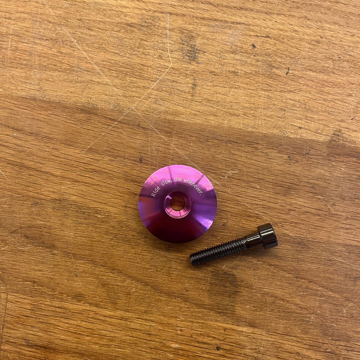 Stridsland - Titanium Top Cap - "Ride Slow, Die Whenever"